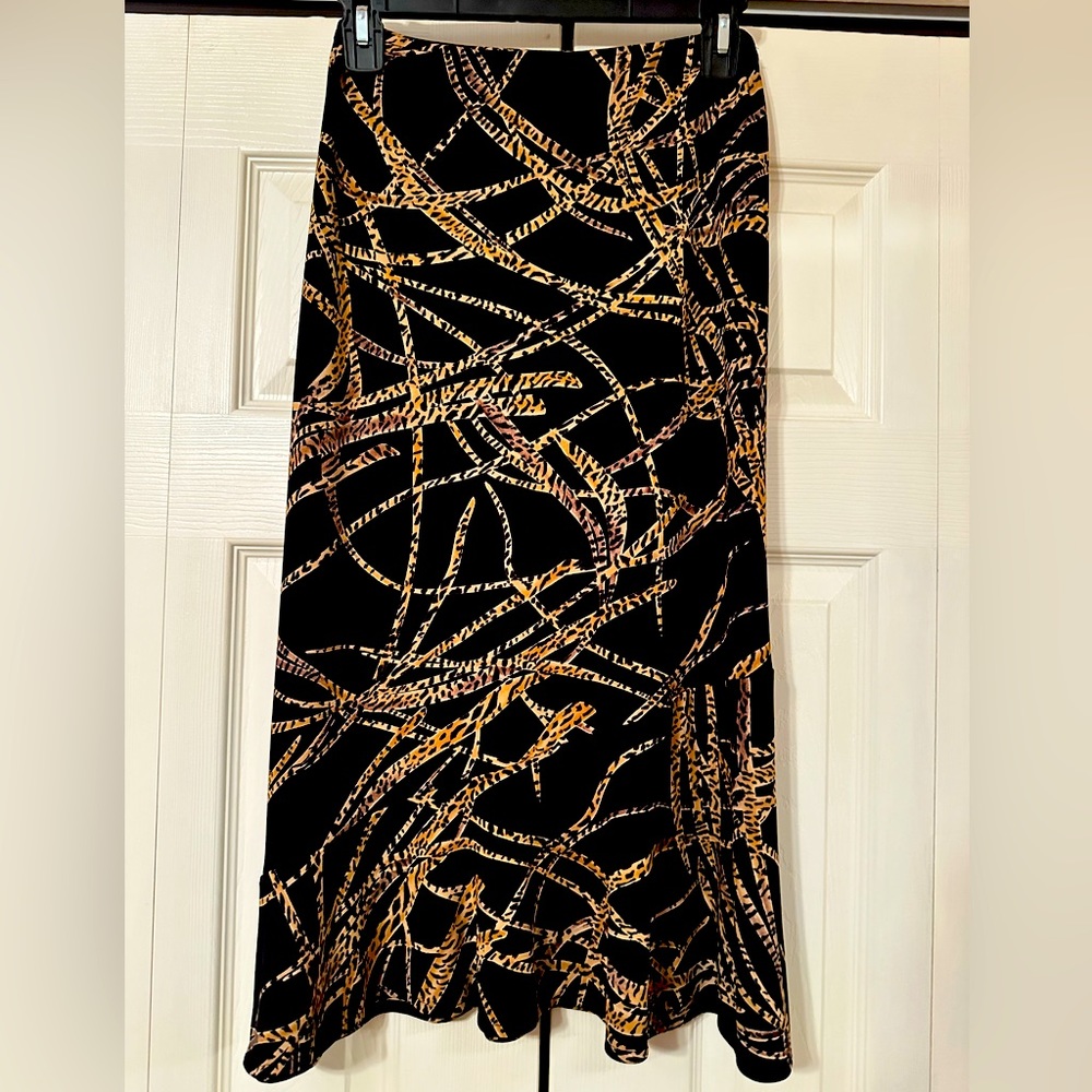 Animal print skirt, black and gold leopard print, no zipper, pull on.